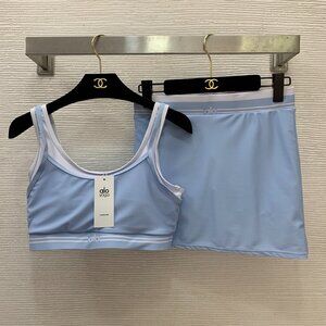 Alo Yoga solid color sports bra with logo + sports skirt, size S